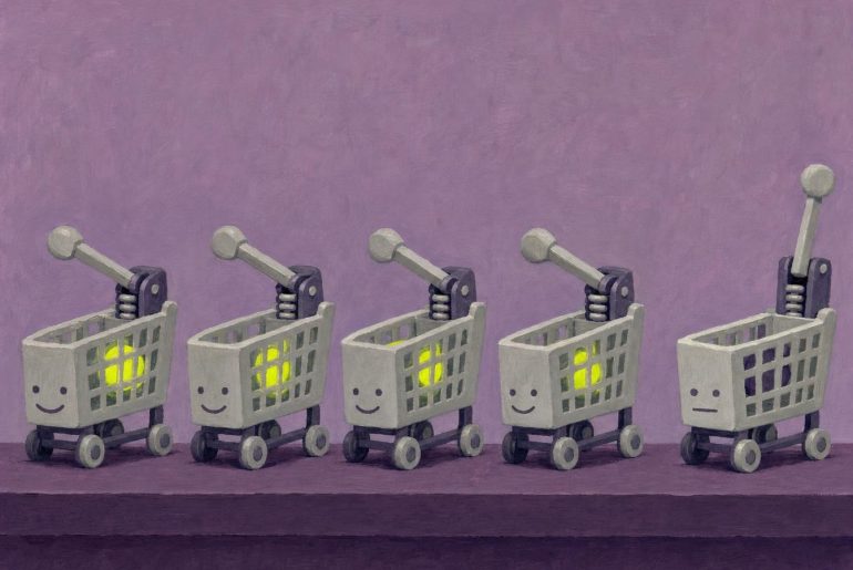 Five miniature carts, four smiling and one sad